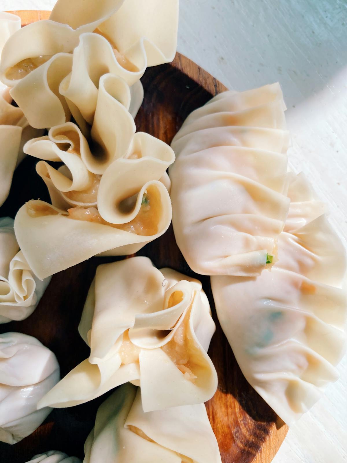 Dumplings on Wooden Plate