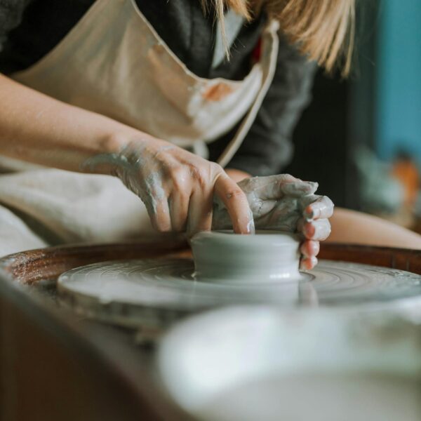 Woman Shaping a Soft Clay